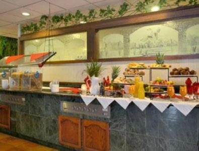 Merced Inn & Suites Restoran fotoğraf